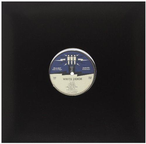 White Denim vinyl record label with geometric design and tracklist.