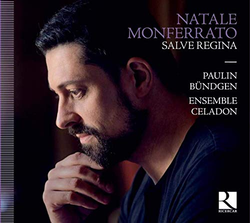 CD cover featuring a portrait of a bearded man in profile, dark background.