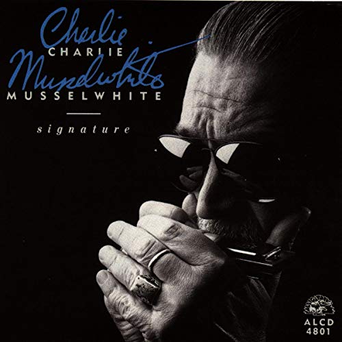 CD cover featuring blues musician Charlie Musselwhite with a harmonica.