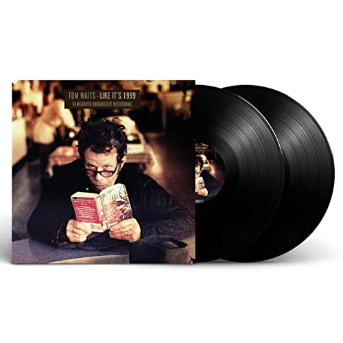 Tom Waits album cover and two black vinyl records.