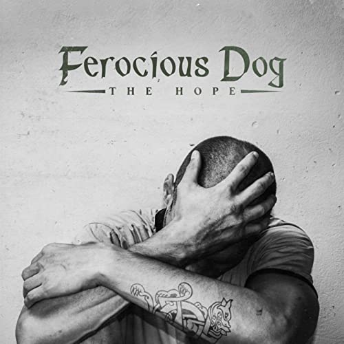 Black and white album cover featuring a man with head in hands.
