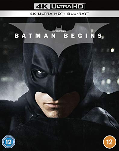 Batman Begins Blu-ray cover featuring a close-up of Batman’s masked face.