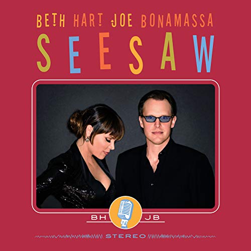 Beth Hart and Joe Bonamassa portrait on a red album cover with colorful text.