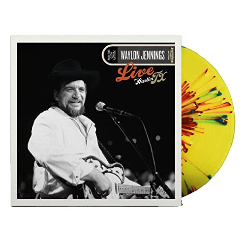 Waylon Jennings album cover and colorful vinyl record shown together.