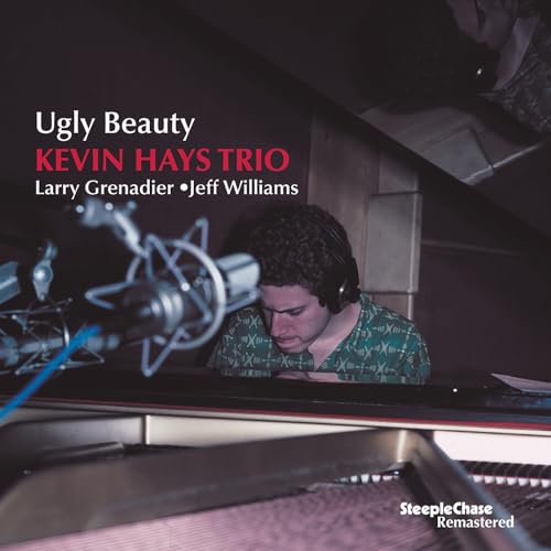 Album cover for Kevin Hays Trio’s “Ugly Beauty” featuring a pianist.