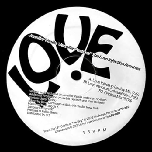 White vinyl record label with bold black text reading "LOVE" and tracklist details.