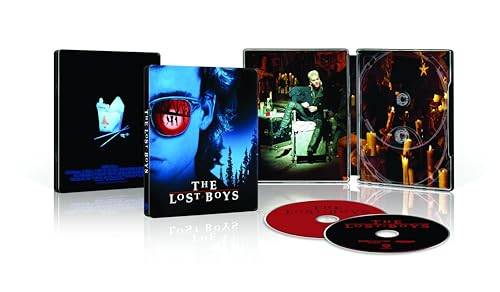 The Lost Boys Blu-ray steelbook case, discs, and interior art showing a candlelit scene.