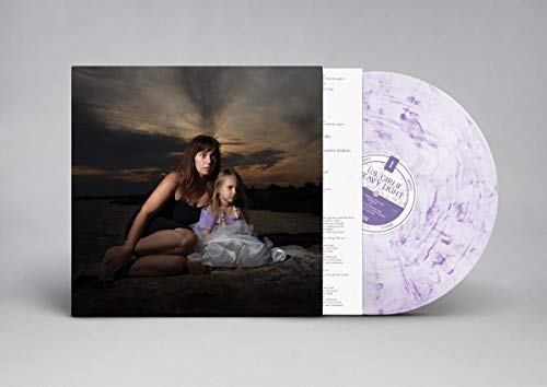U.S. Girls “Heavy Light” vinyl record with cover art of two figures.