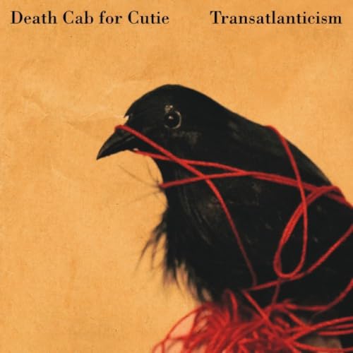 Album cover for Death Cab for Cutie’s Transatlanticism featuring a bird with red string.