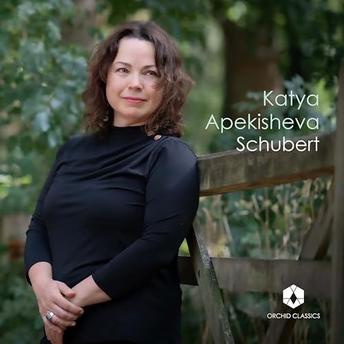 Katya Apekisheva portrait for Schubert CD, woman with brown wavy hair.