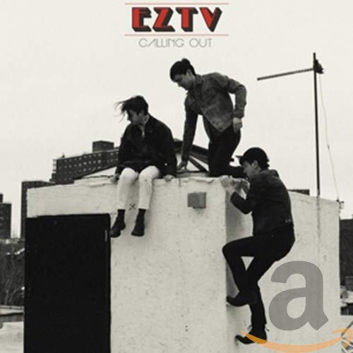 Black and white album cover with three people on a rooftop.