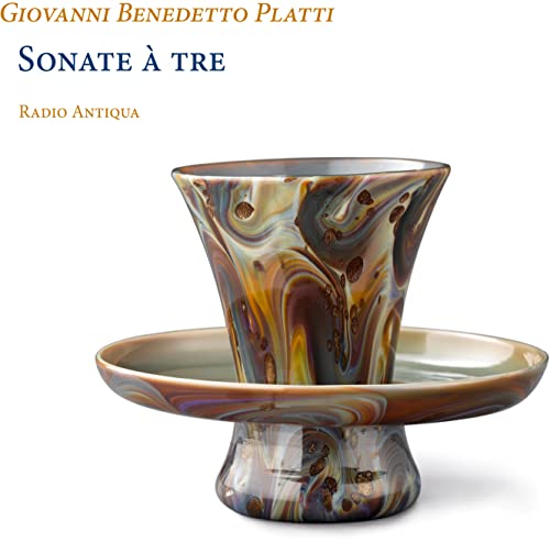 CD cover featuring a colorful, marbled glass chalice on a saucer.
