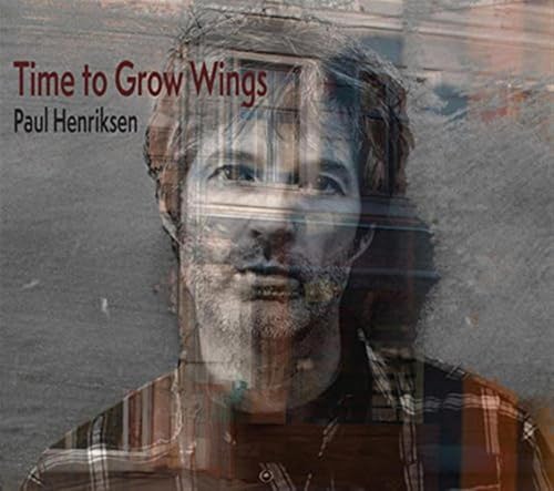 CD cover featuring a blurred portrait of a man with facial hair.