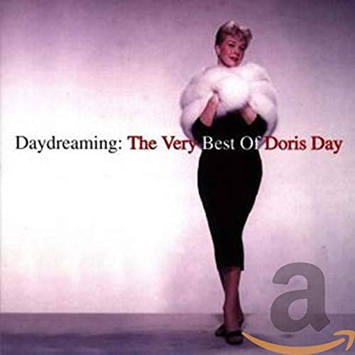 Doris Day album cover, showing her holding a fluffy white stole.