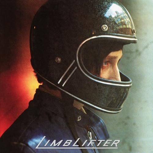 Person wearing a black motorcycle helmet, album cover art.