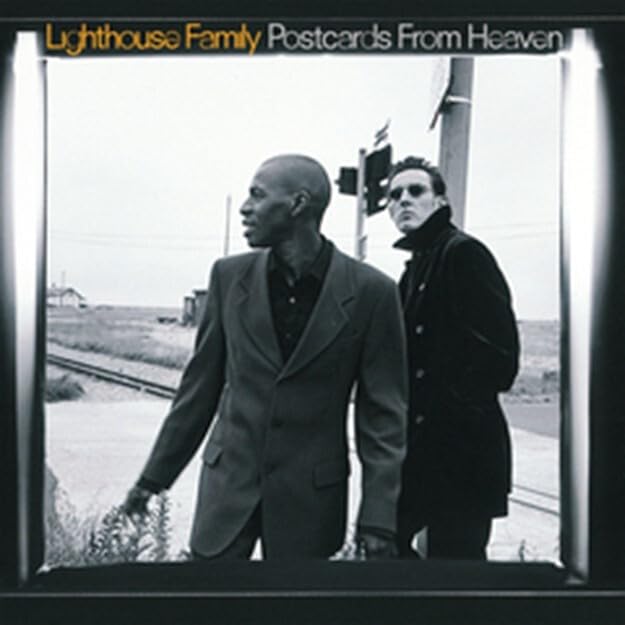Black and white album cover featuring the Lighthouse Family duo standing outdoors.