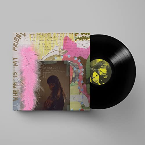 Wednesday album cover and black vinyl record with portrait label.