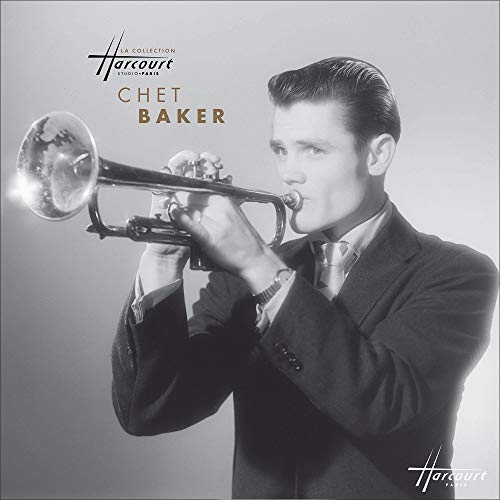 Chet Baker playing trumpet, album cover in grayscale tones.