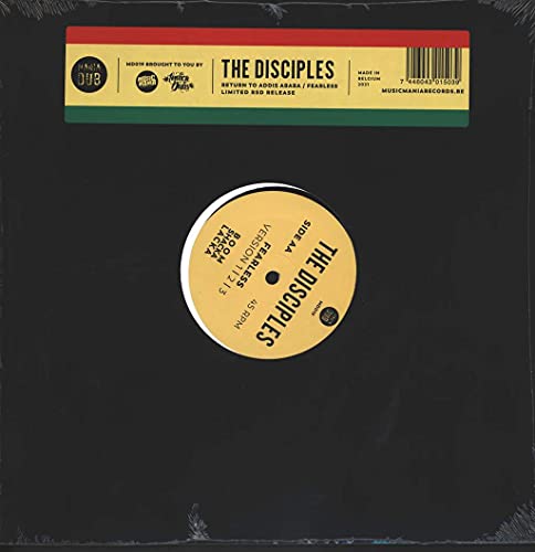 Black vinyl record with yellow and green label, featuring text and barcode.