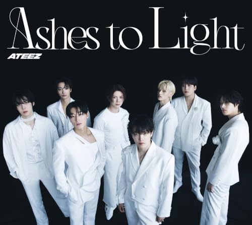 Ateez, eight men in white suits, against a black background.