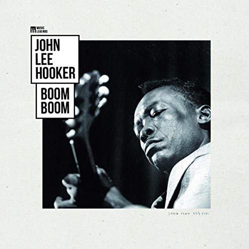 John Lee Hooker’s “Boom Boom” vinyl record cover with a portrait.