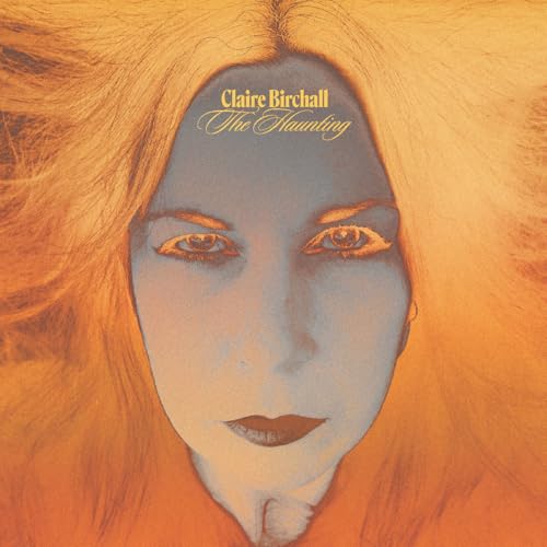 Album cover for Claire Birchallās āThe Hauntingā featuring a womanās face.