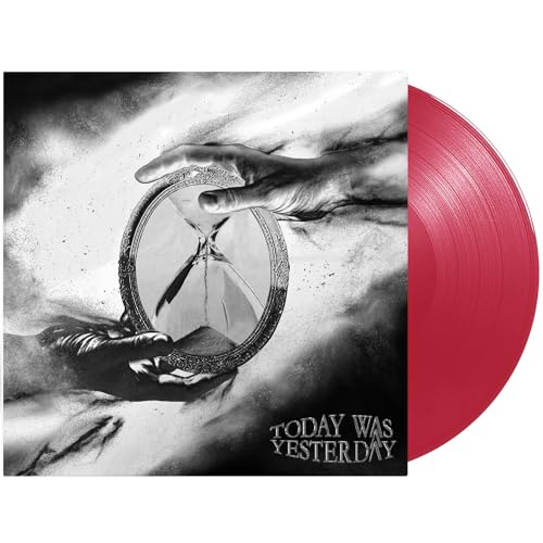 Vinyl record and album cover with cracked mirror imagery.
