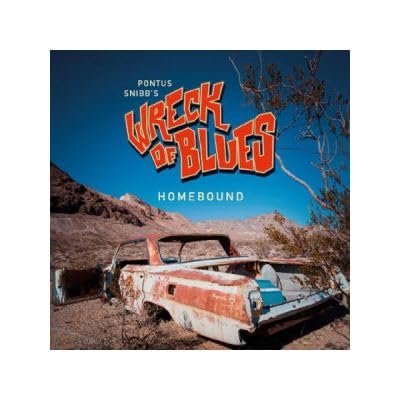 Vinyl album cover featuring a rusted car in a desert landscape.