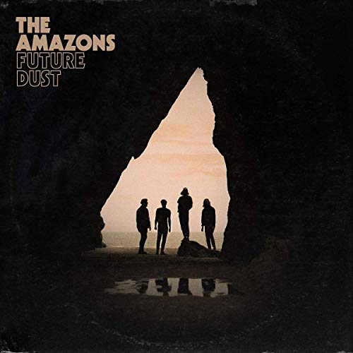 Four silhouettes of people standing inside a dark cave opening against a light sky.