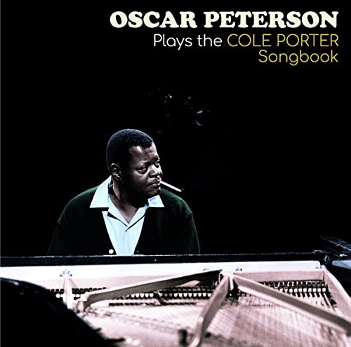 Oscar Peterson at a piano, album cover for “Plays the Cole Porter Songbook.”