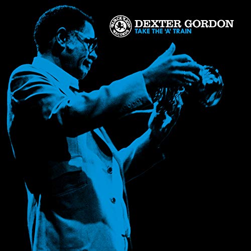 Dexter Gordon album cover, blue tone, musician with saxophone.