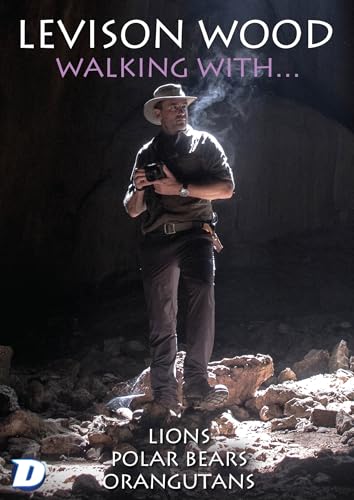 Levison Wood stands in a cave, holding a camera, DVD cover.