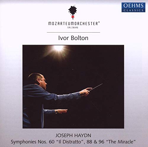 CD cover featuring a conductor silhouetted against a bright light.