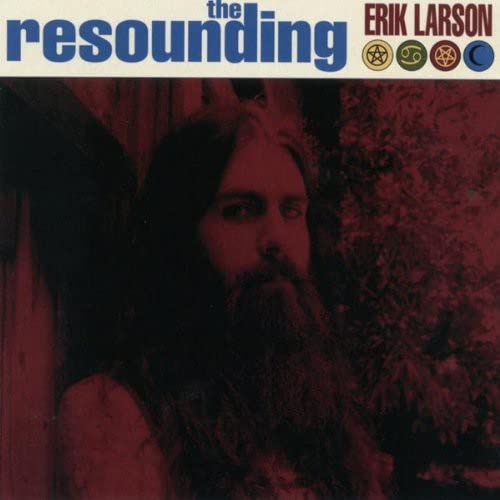 CD cover featuring a portrait of a bearded man with long hair.