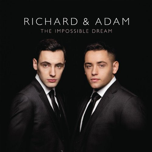 Richard & Adam album cover, two men in suits on black background.