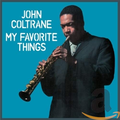 John Coltrane album cover featuring the musician playing a saxophone.