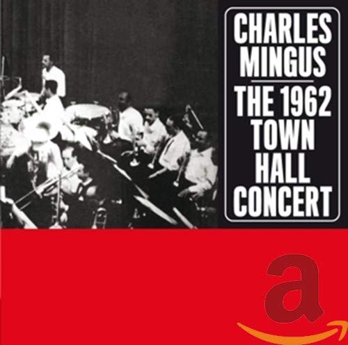 Black and white photo of a jazz orchestra with text reading Charles Mingus concert.