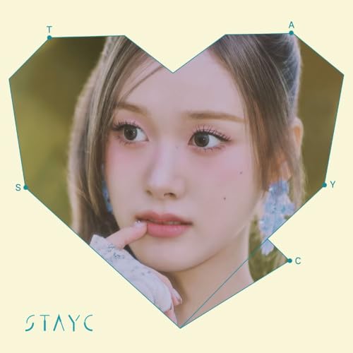 Close-up of a young woman framed within a geometric heart shape.