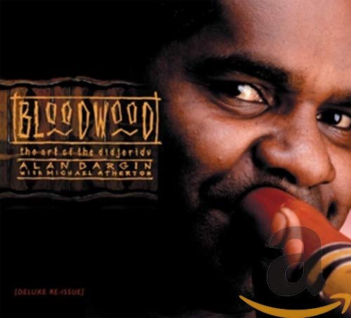 CD cover featuring Alan Dargin playing a didgeridoo, close-up portrait.