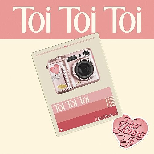 CD cover featuring a pink vintage camera and text “Toi Toi Toi”.