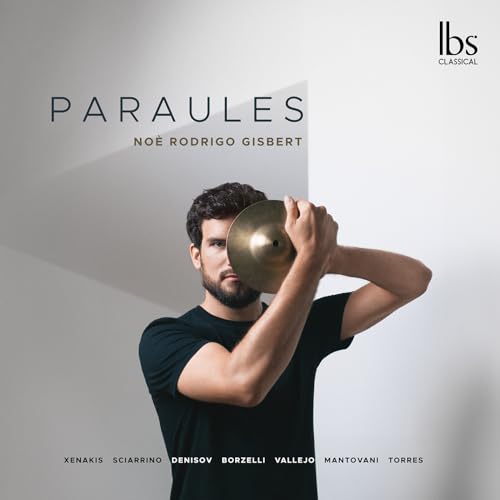 CD cover: Man holding a cymbal, text “Paraules” and artist name.