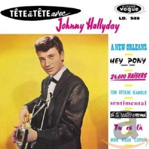 CD cover featuring Johnny Hallyday in a suit, with song titles listed.