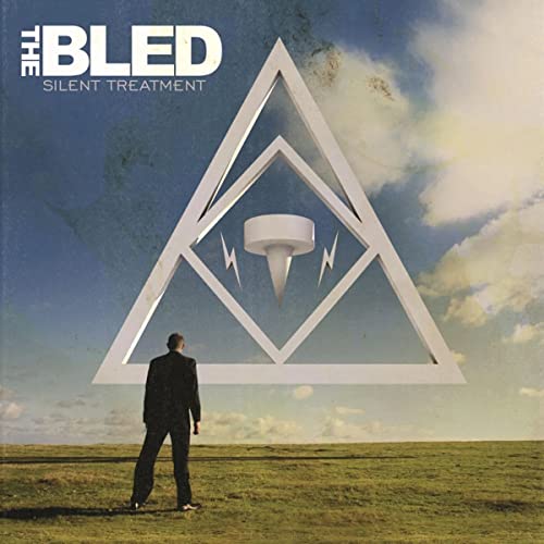 Album cover for The Bledās āSilent Treatmentā with a man and triangle.