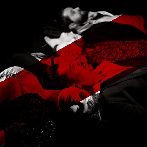Black and white portrait split by a bold red diagonal stripe.