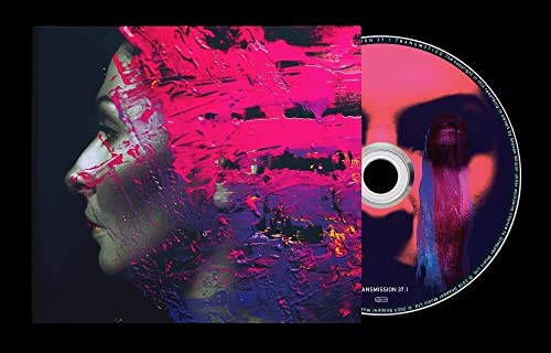 CD case featuring a profile portrait partially obscured by bright pink and purple paint.