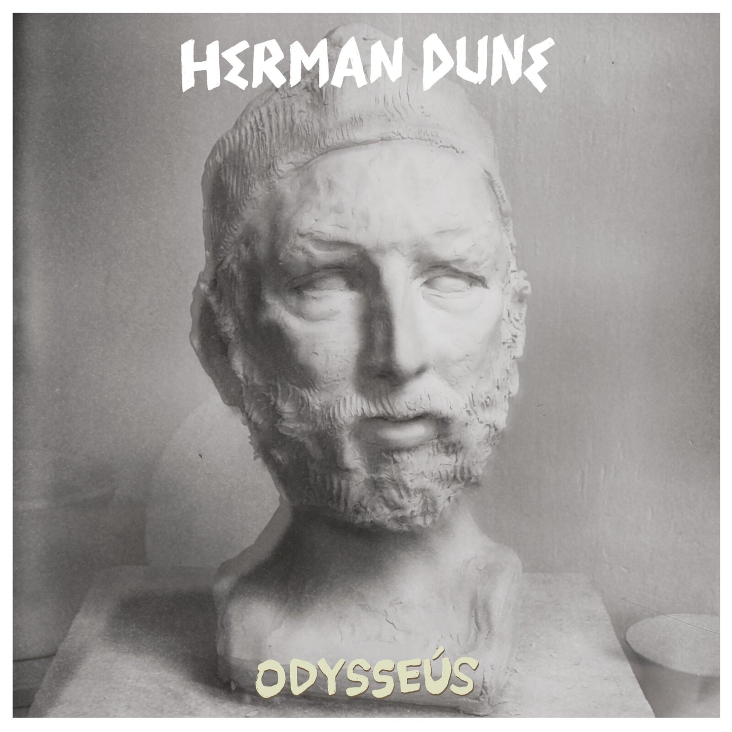 Album cover for Herman Dune’s “Odysseus” featuring a marble bust.