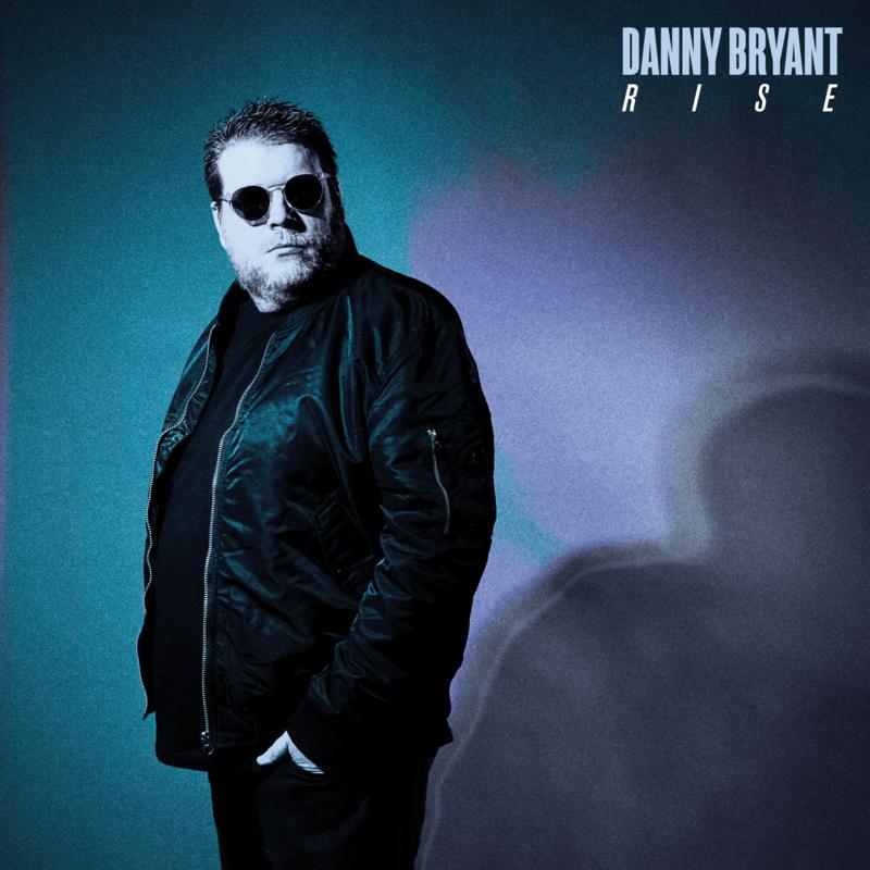 Danny Bryant album cover: portrait of a man in sunglasses, blue background.