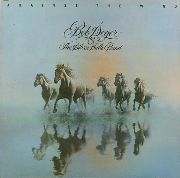 Album cover: Bob Seger, horses running through shallow water.