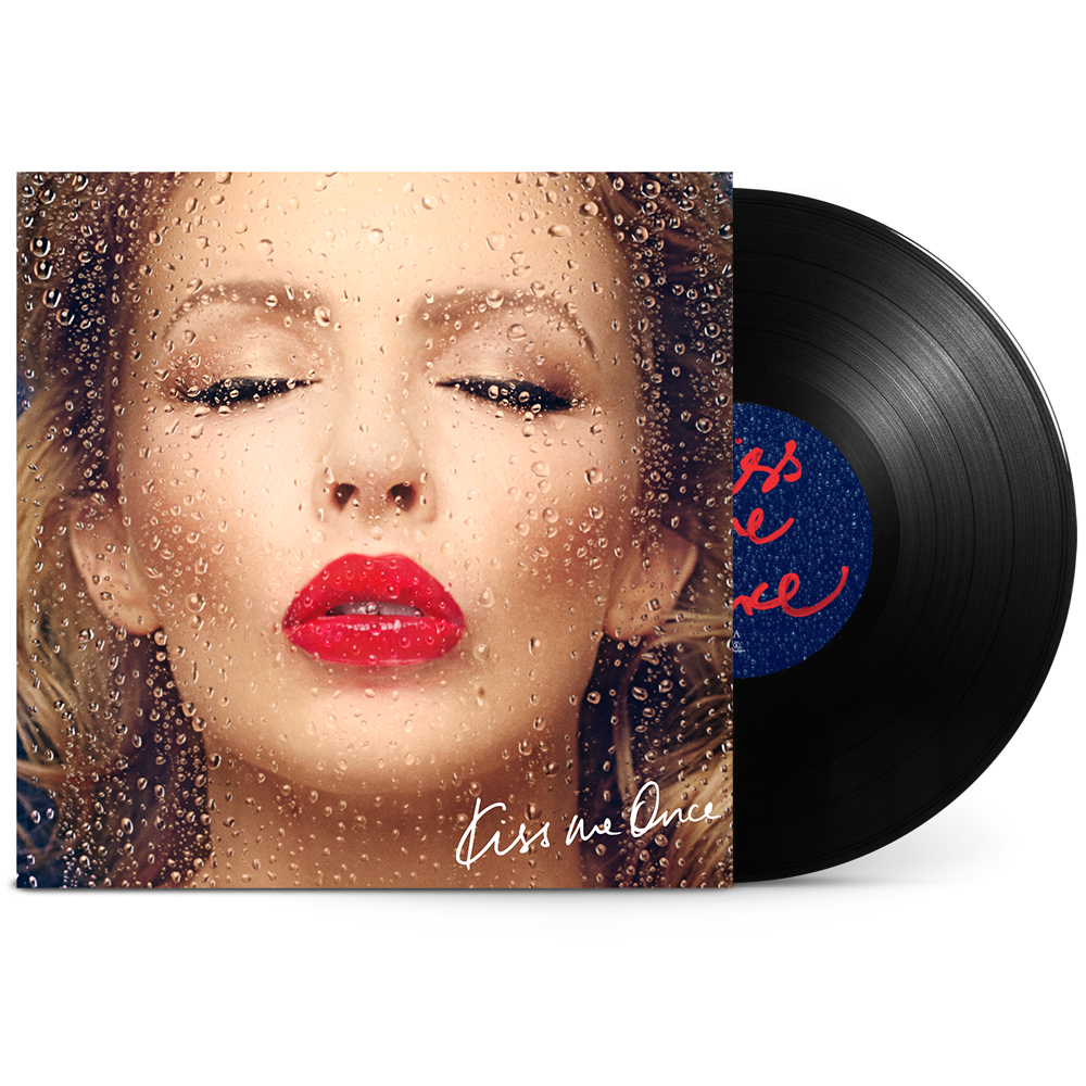 Kylie Minogue “Kiss Me Once” vinyl record with wet-look album cover.