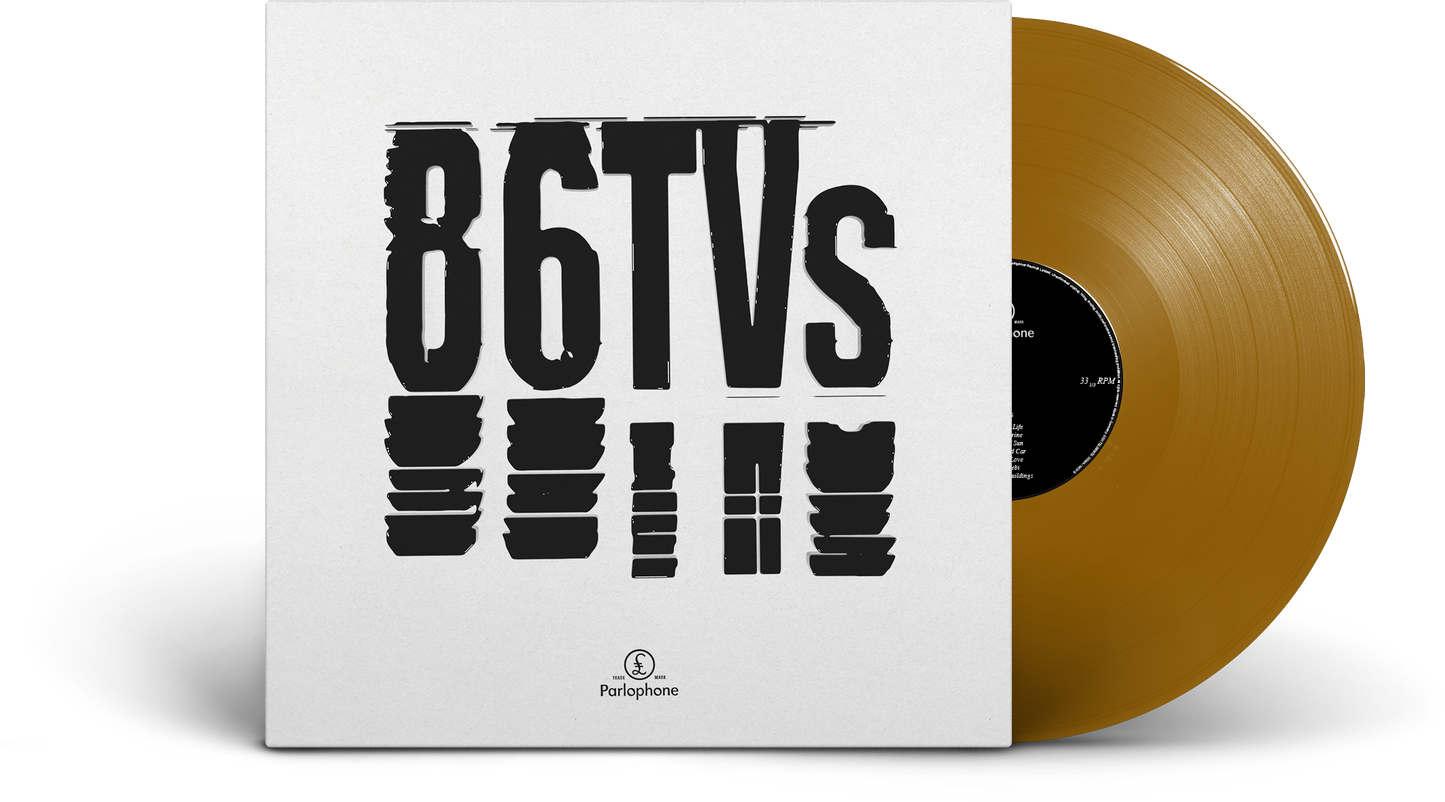 Vinyl record with tan-colored disc and white cover displaying bold black text.